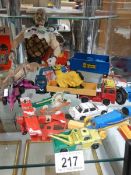 A mixed lot of old toys.