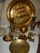 A mixed lot of brassware including plaque, pair of vases, toast rack etc.,