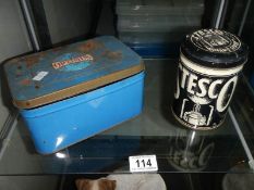 A Stesco Hikers Stove in original tin and another stove also in original tin.