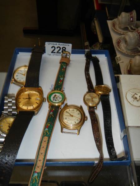 A quantity of wrist watches.