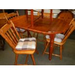 A pine dining table and four chairs, COLLECT ONLY.