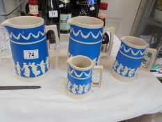 Four Copeland Dancing Lady jugs.