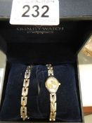 A ladies watch and bracelet set.