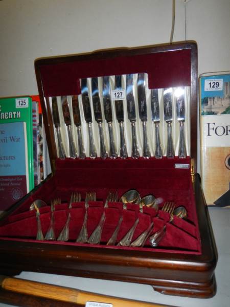 A good quality mahogany cased canteen of cutlery.