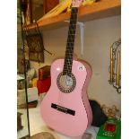 A pink acoustic guitar, COLLECT ONLY.