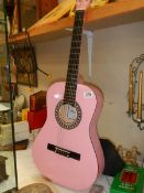 A pink acoustic guitar, COLLECT ONLY.