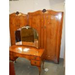 A mahogany bedroom suite comprising triple mirror dressing table and two wardrobes, COLLECT ONLY.