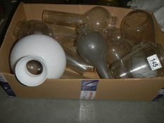 A box of oil lamp chimneys etc., COLLECT ONLY.