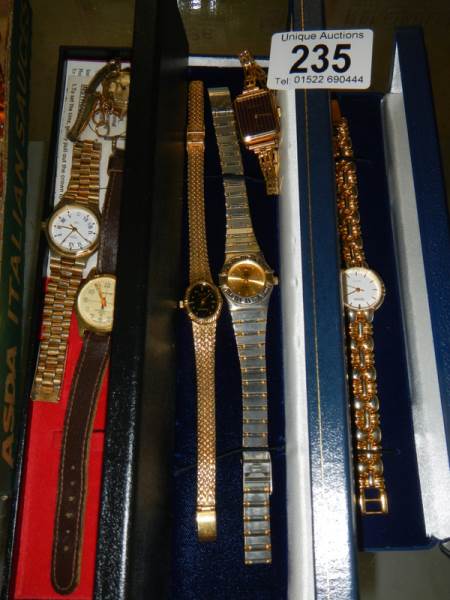 A quantity of wrist watches.