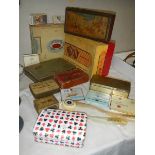A mixed lot of old tins etc.,