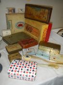 A mixed lot of old tins etc.,