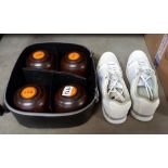 A bag with bowls and bowling shoes