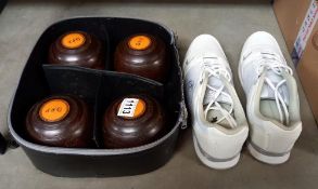 A bag with bowls and bowling shoes