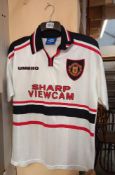 A 1999 Manchester United away shirt, size M