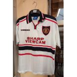 A 1999 Manchester United away shirt, size M