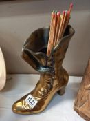 A large vintage brass ladies Victorian style boot match holder height 25cm