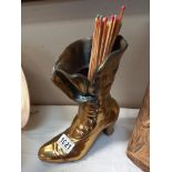 A large vintage brass ladies Victorian style boot match holder height 25cm