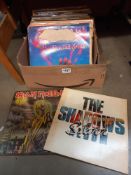 A box of vinyl records including The Shadows, country and western etc