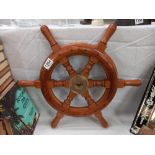 A wooden ships wheel with brass hub COLLECT ONLY