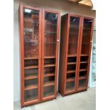 2 mahogany effect 2 door book cases/display cabinets COLLECT ONLY