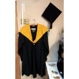 A boxed mortar board & Graduation gown