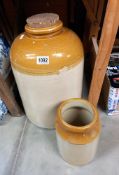 A large stoneware storage jar with cork stopper, no makers mark and 1 other stoneware jar COLLECT