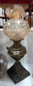 A Victorian cast iron & brass oil lamp with later shade COLLECT ONLY