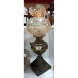 A Victorian cast iron & brass oil lamp with later shade COLLECT ONLY