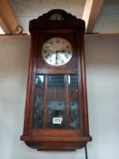 A 1930's oak wall clock COLLECT ONLY