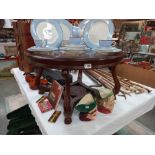 A dark wood stained round coffee table with glass top, 80cm x 45cm COLLECT ONLY