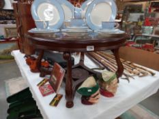 A dark wood stained round coffee table with glass top, 80cm x 45cm COLLECT ONLY