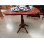 A mahogany tea table on centre column base COLLECT ONLY.