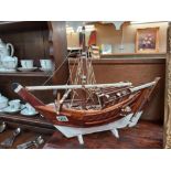 A wooden model of a boat COLLECT ONLY.