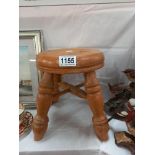 A small oak stool with turned legs COLLECT ONLY.