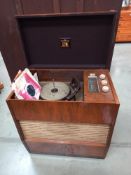 A vintage HMV radio-gramme & quantity of records. COLLECT ONLY.