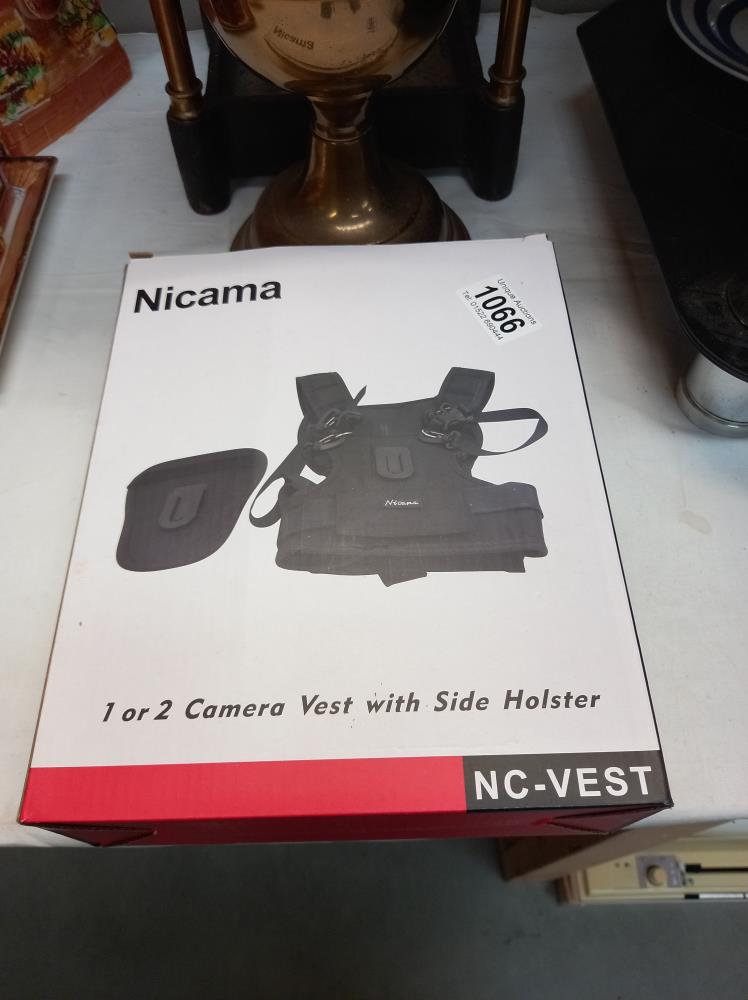 A boxed as new Nicama camera vest, NC-Vest
