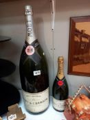 A display Salamanzar bottle of Moet & Chandon champagne & another display bottle of Moet & Chandon