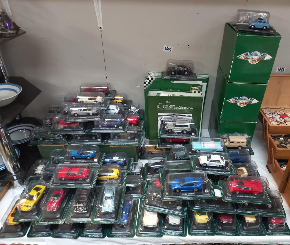A collection of 70 die cast models from 'The Classic Car Collection' including fact cards etc.