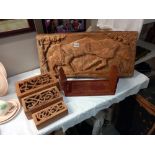 Three wooden boxes, a wooden book rack & a carved wooden picture COLLECT ONLY