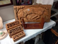 Three wooden boxes, a wooden book rack & a carved wooden picture COLLECT ONLY