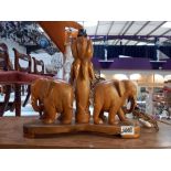 A vintage African carved wooden table lamp of 2 elephants by a tree, approximate height 33cm,