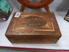 A Prisoner Of War 19th century straw work box with figural scene to lid and ship at sea scene to