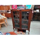 An Edwardian mahogany display cabinet with leaded glass doors COLLECT ONLY