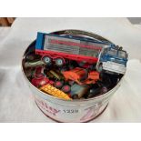 A tin of old play worn die cast including Corgi & Matchbox