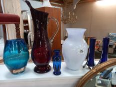 A Victorian hand painted blue glass vase, a pair of vintage spill vases & 3 coloured art glass vases