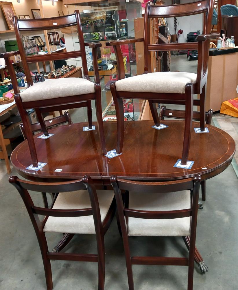 A dark wood stained oval extending table & 6 chairs COLLECT ONLY