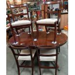 A dark wood stained oval extending table & 6 chairs COLLECT ONLY