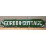 A Decorative EDWARDIAN enamel sign GORDON COTTAGE