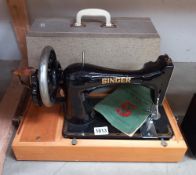 A vintage Singer sewing machine COLLECT ONLY