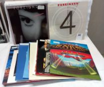A mixed lot of Pop/Rock LP's & 12" singles, including Boston, Thin Lizzy & Colosseum II etc. RCM